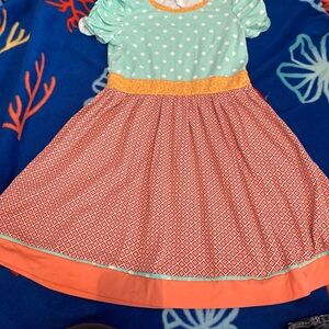 Colorful Kids Dress with Polka Dots and Geometric Patterns